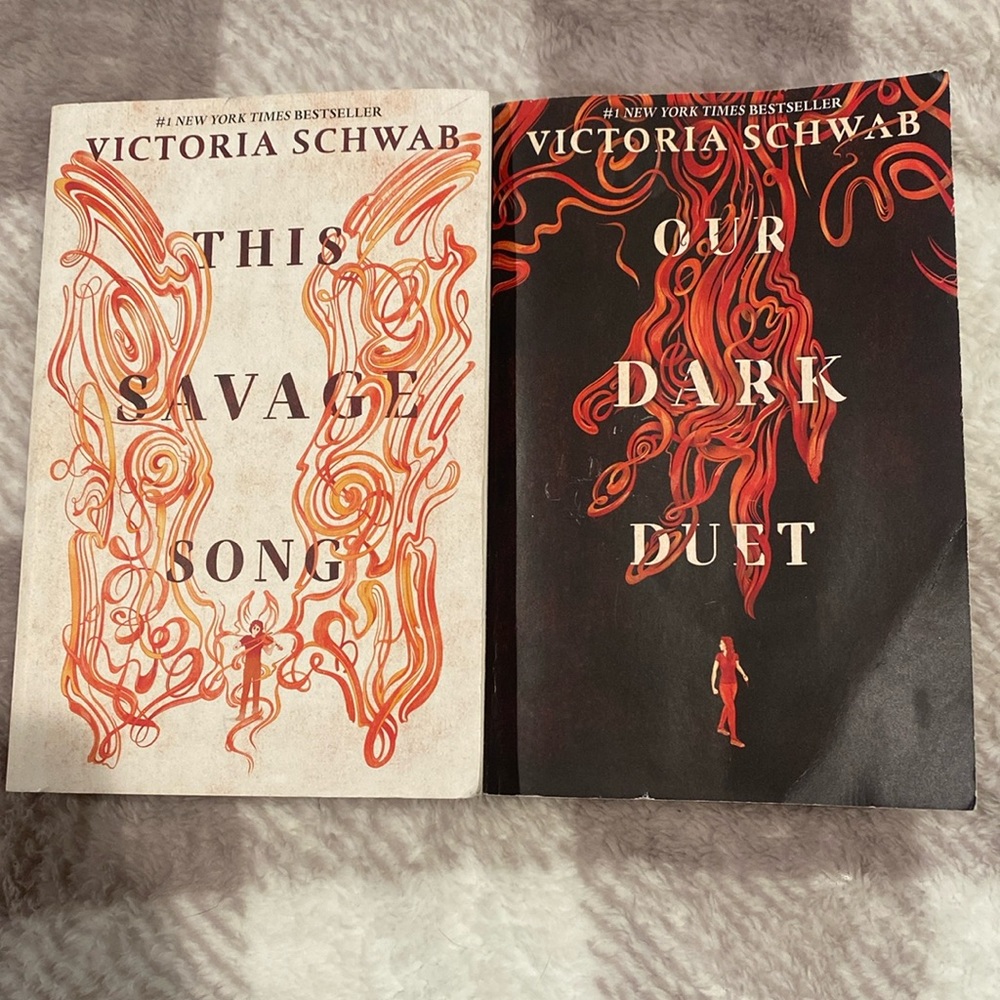 2 book combo: Victoria Schwab-  THIS SAVAGE SONG and the sequel, OUR DARK DUET